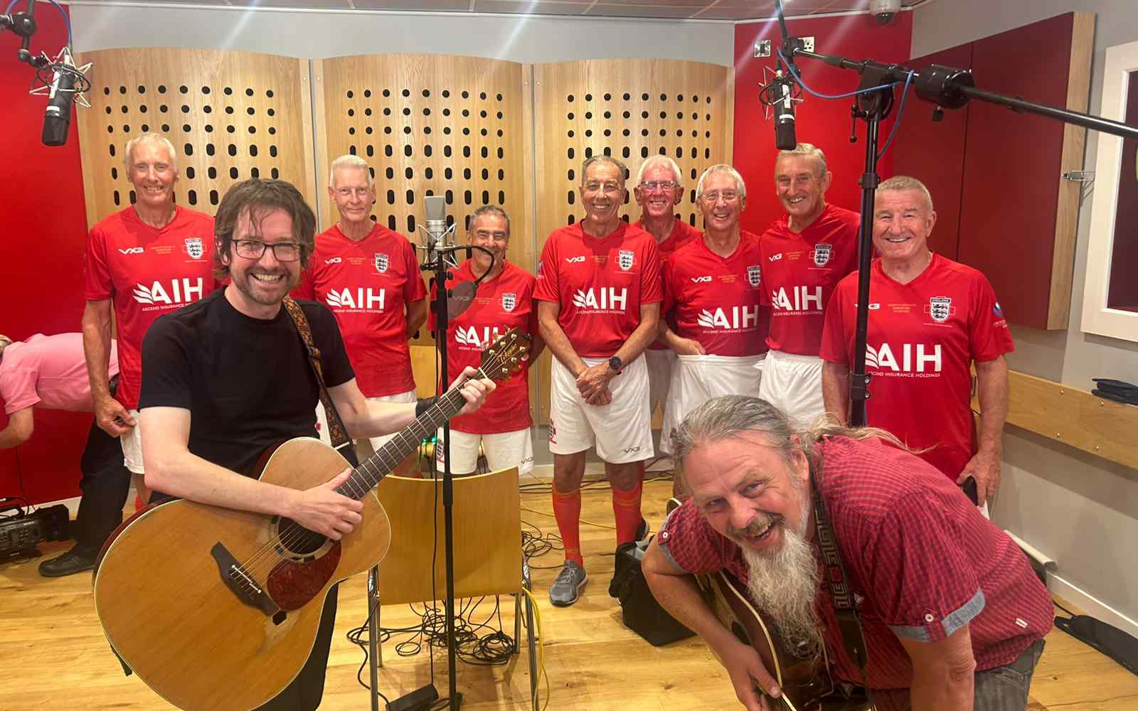 Silver Lions team and two musicians in a recording student