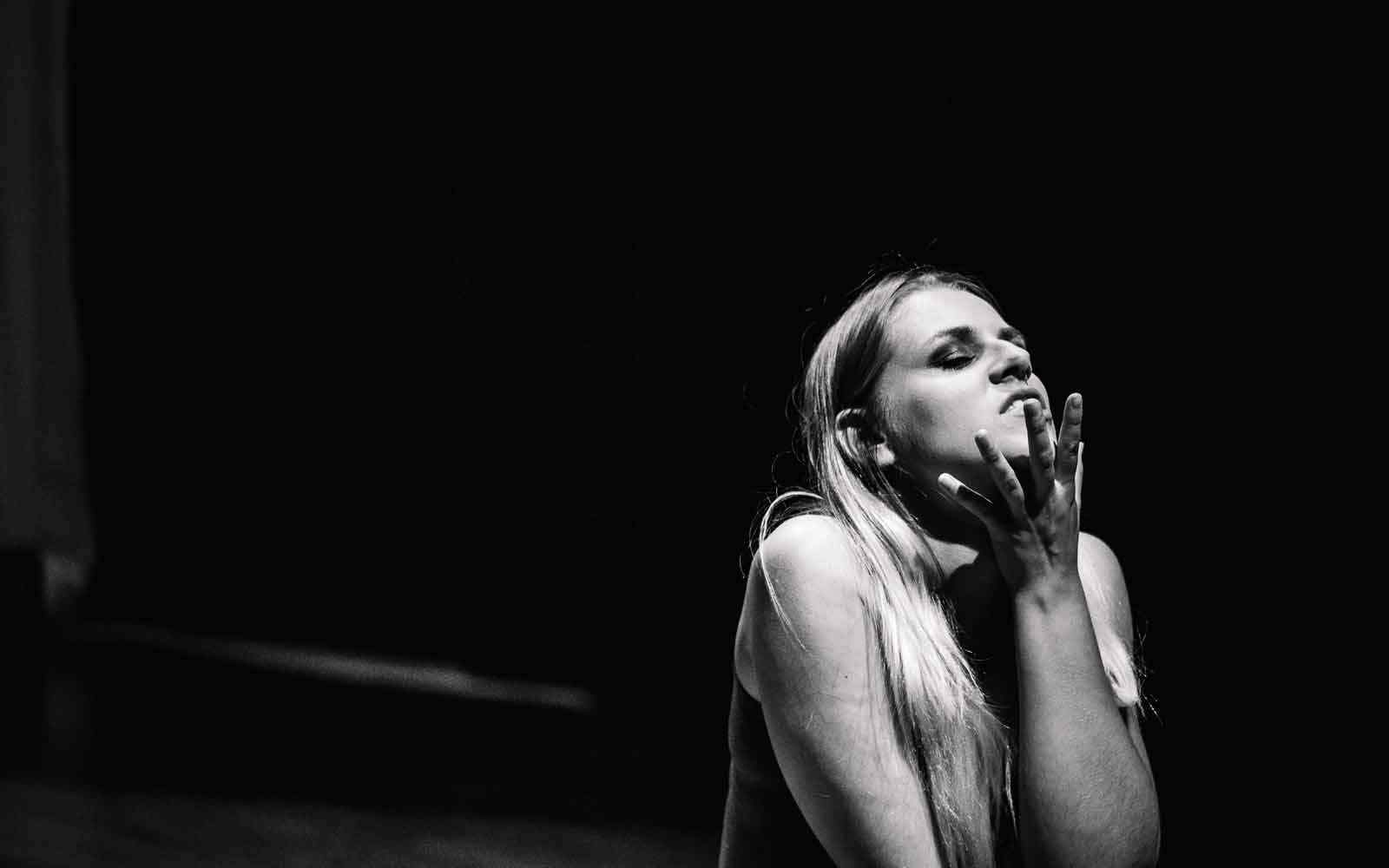 Black and white image of student acting