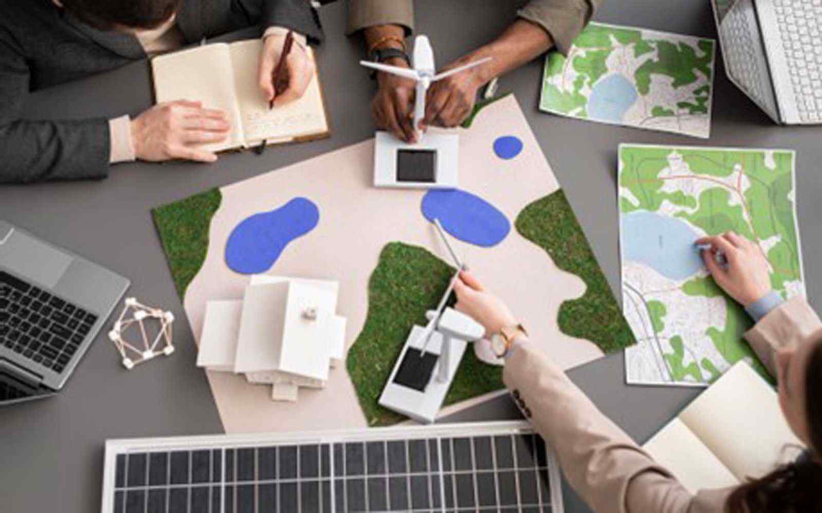A group of people having a meeting about carbon neutrality