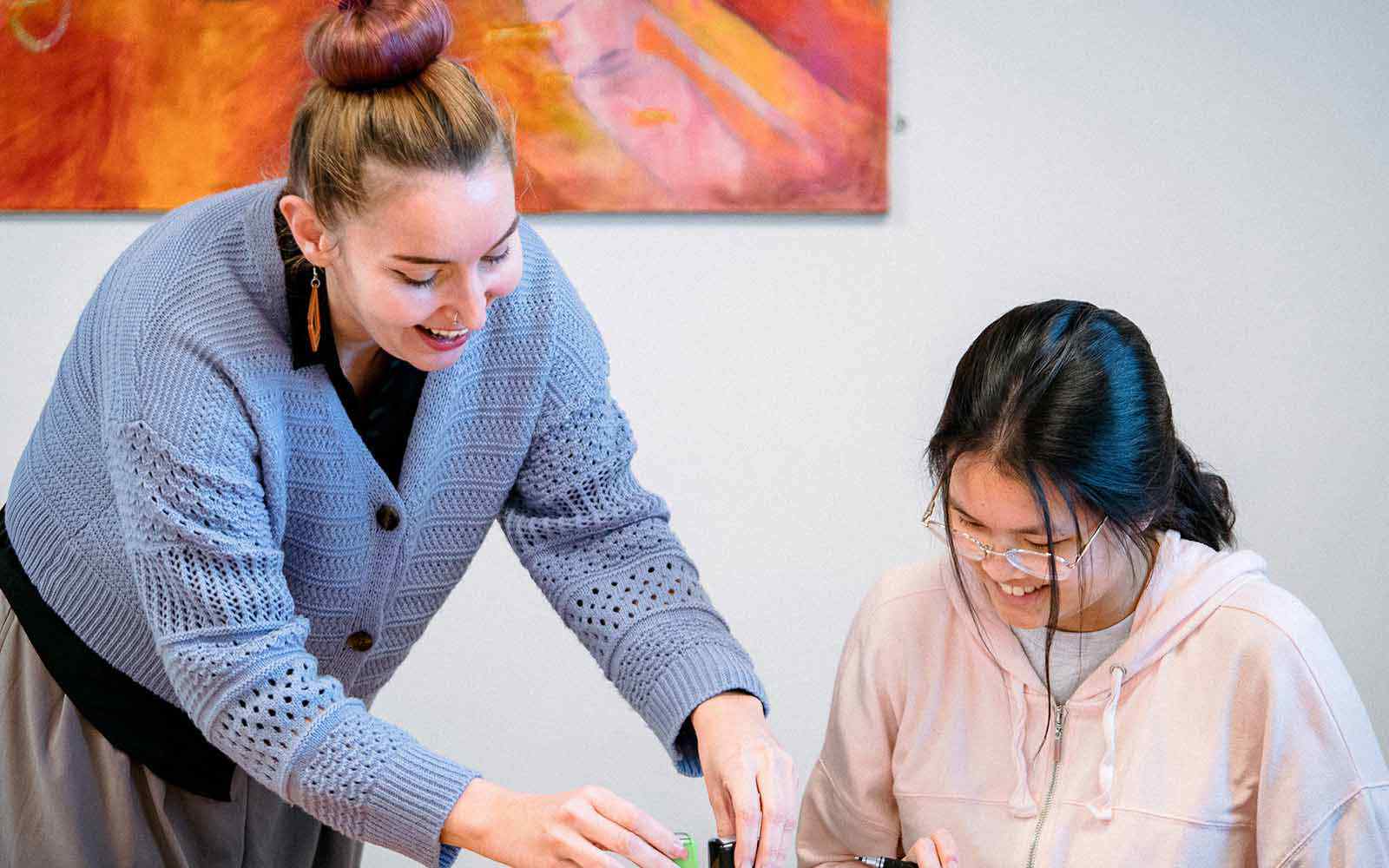 Teacher with student