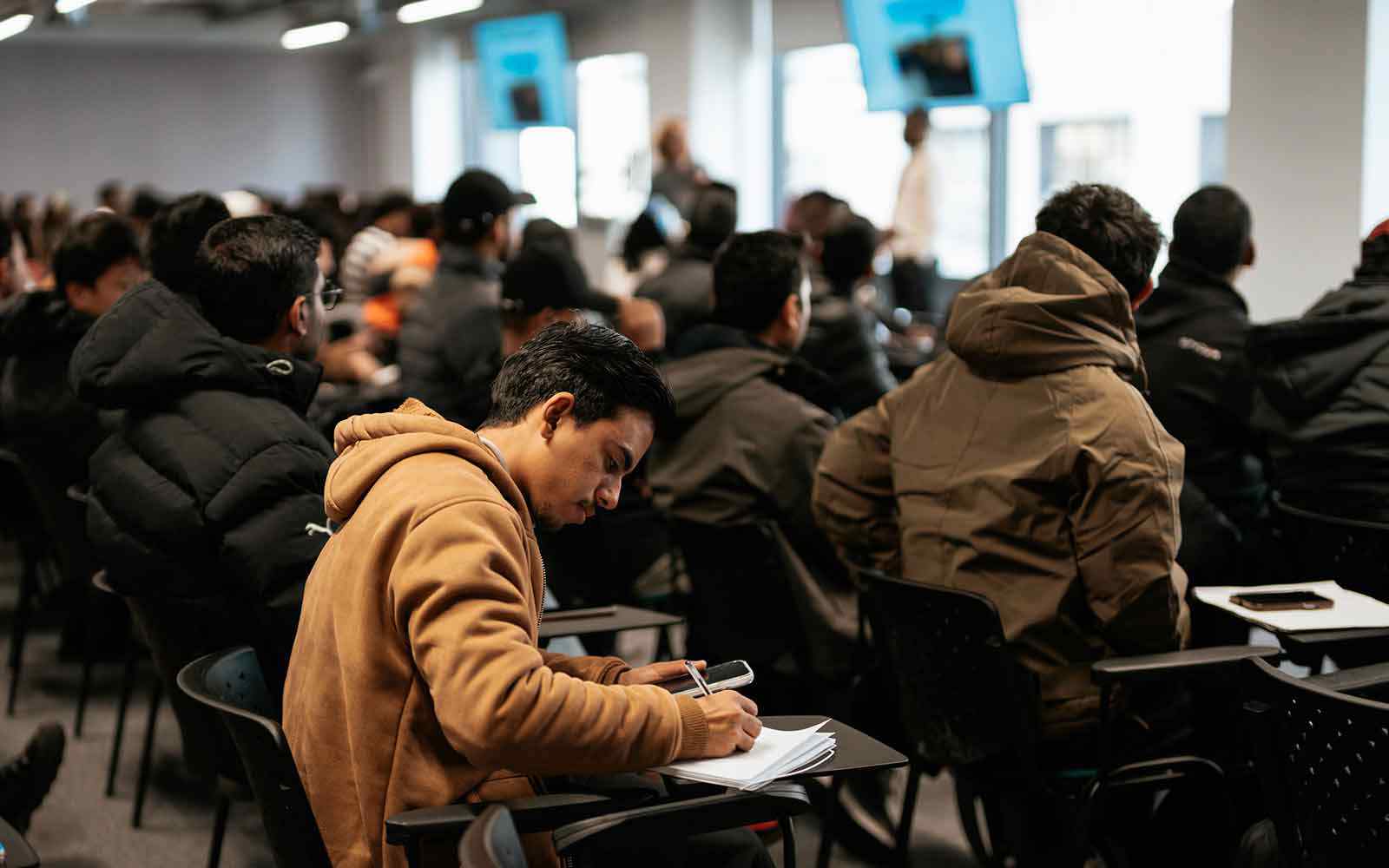 A student working in a classroom at our London campus