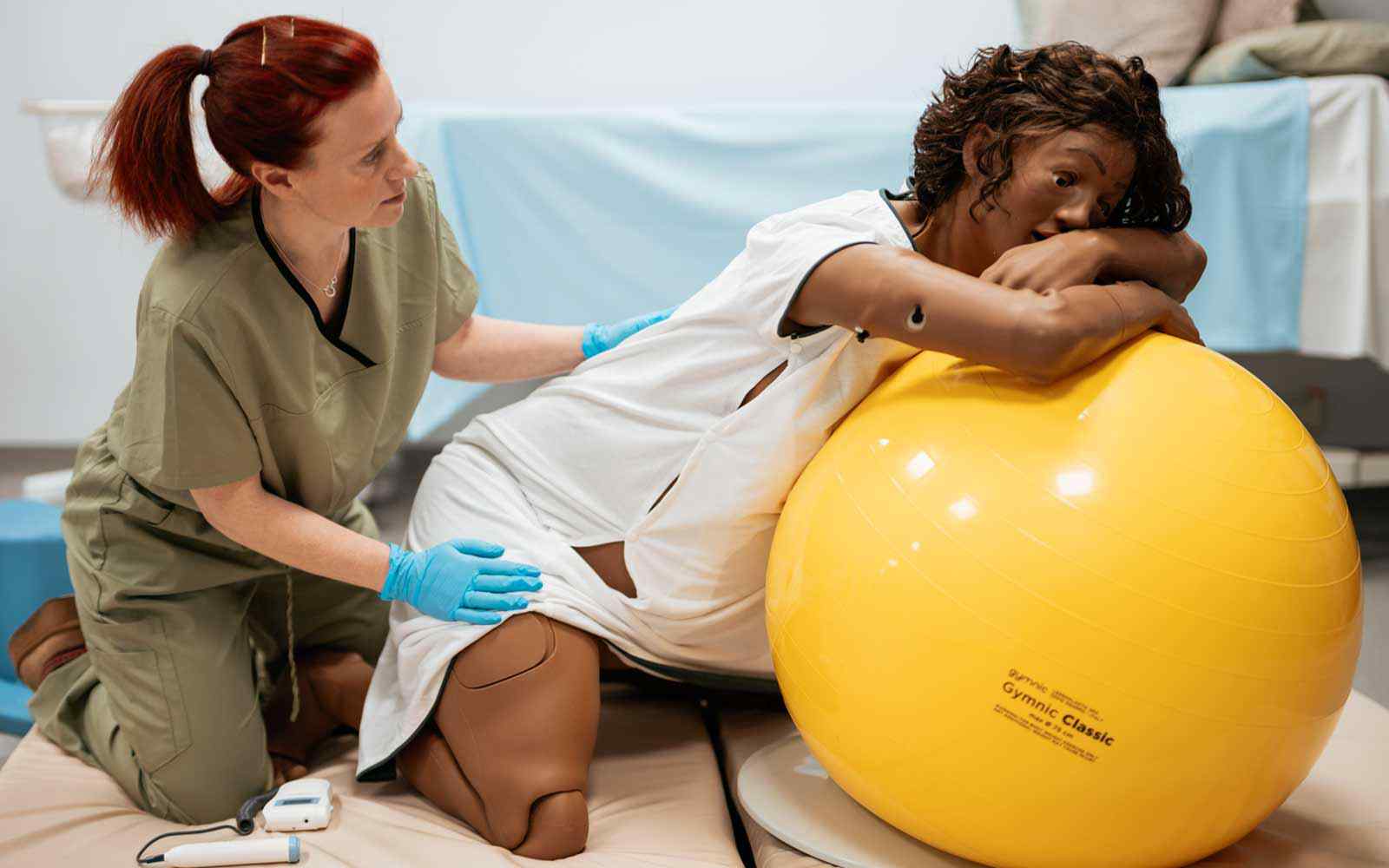 A manaquin with a ball in labour
