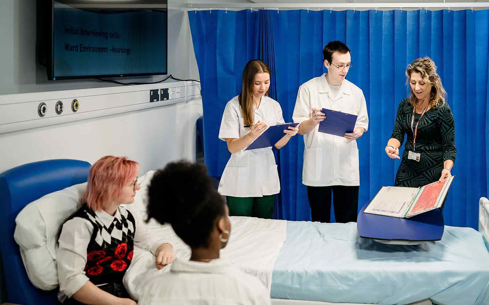 Occupational Therapy students in a ward setting.