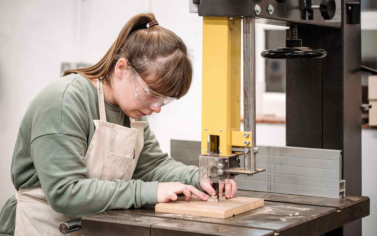 A student uses product design tools.