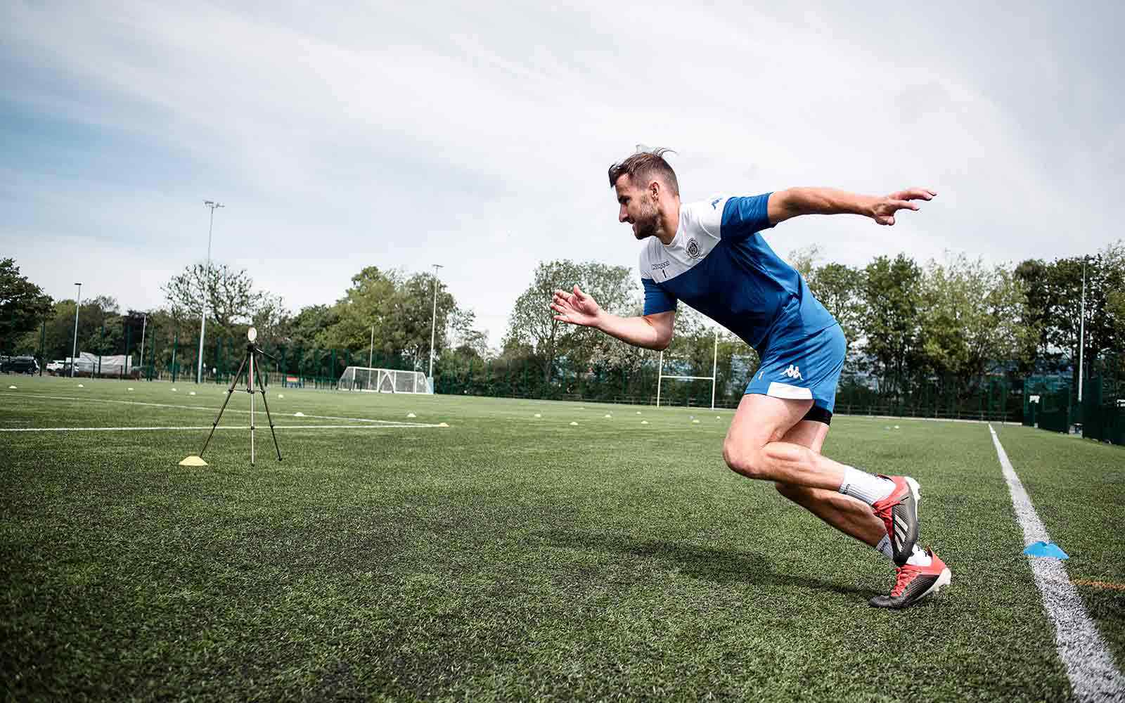 Student running on Sports Park track.