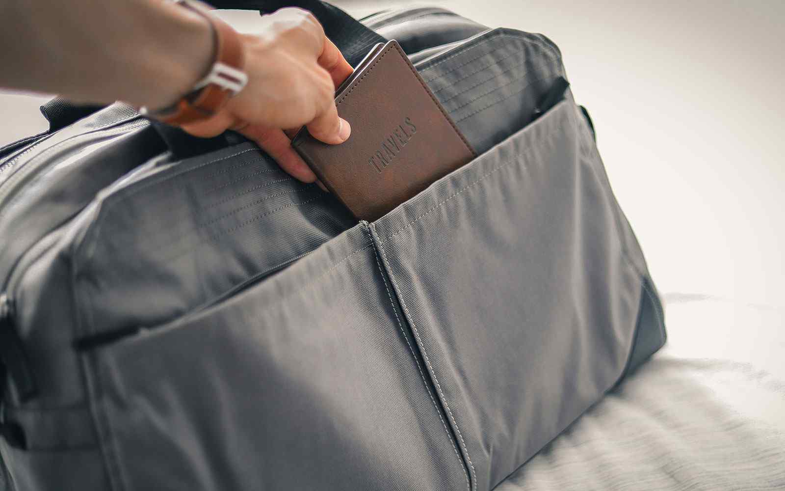Putting item into a travel bag