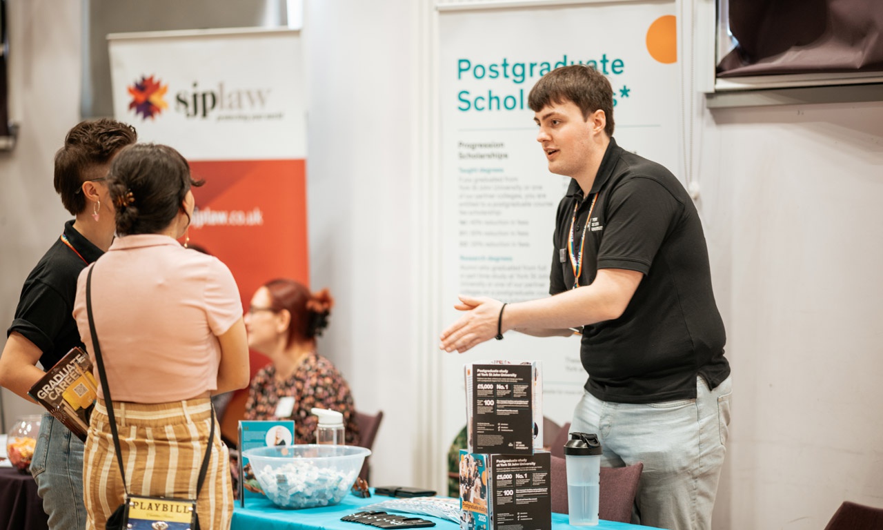 Postgraduate study stall at graduate careers fair 