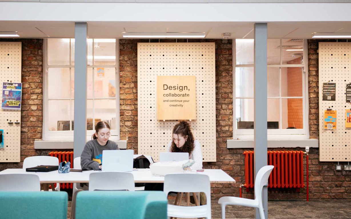 Two students studying in the Design Centre. 