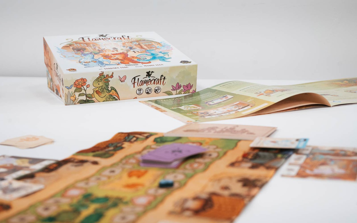 The box and board for the game Flamecraft. 