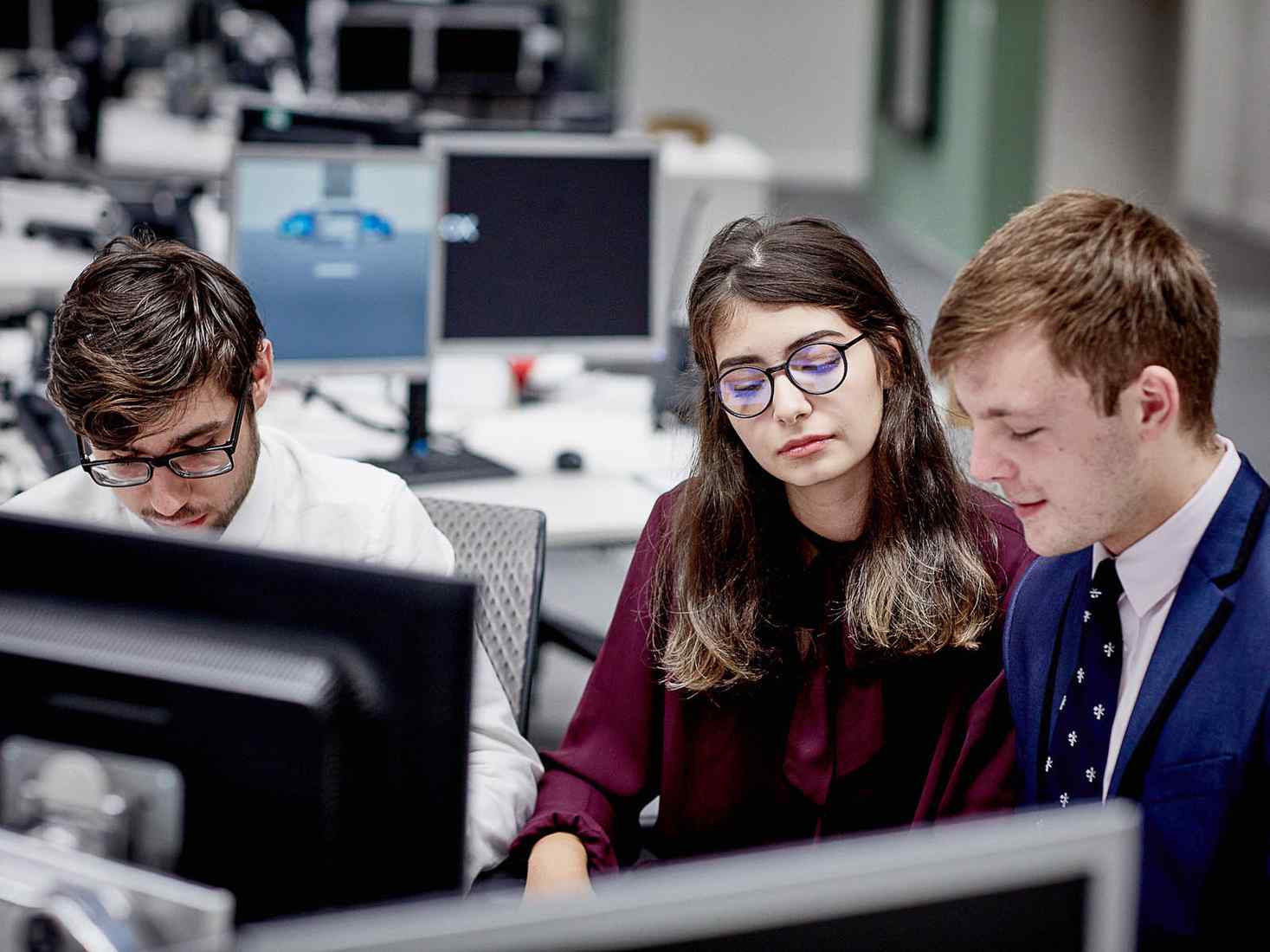Students working in group in computer room 