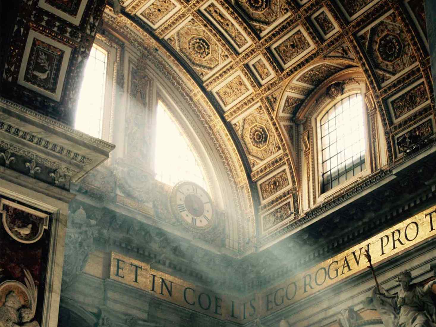 Interior of church with rays of light from window. 