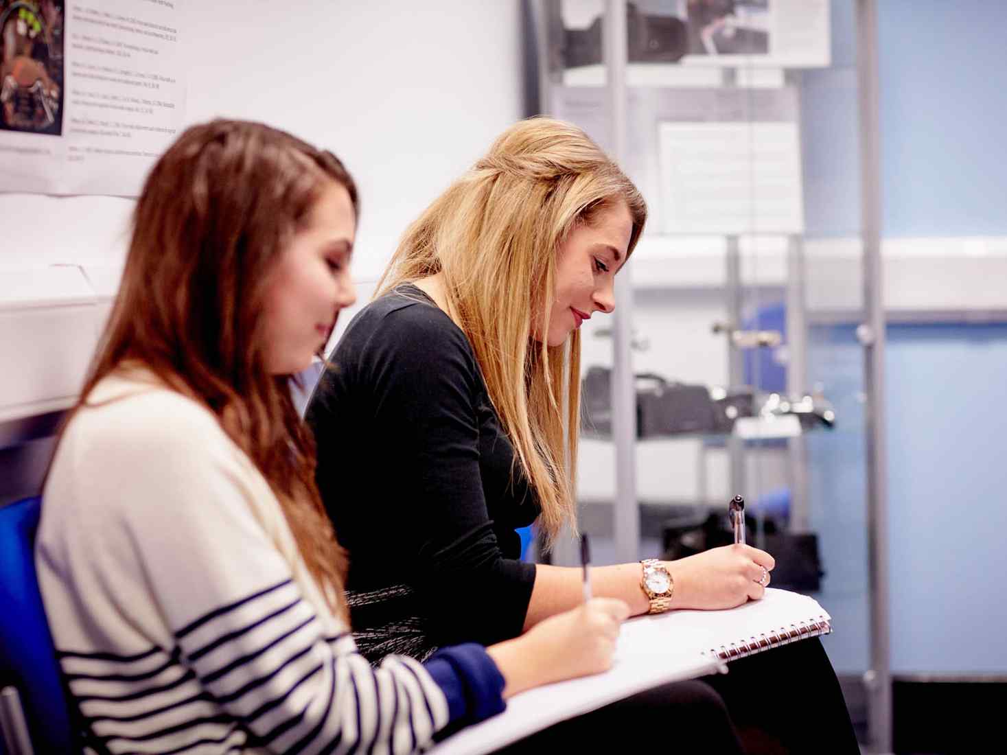 Students taking notes 