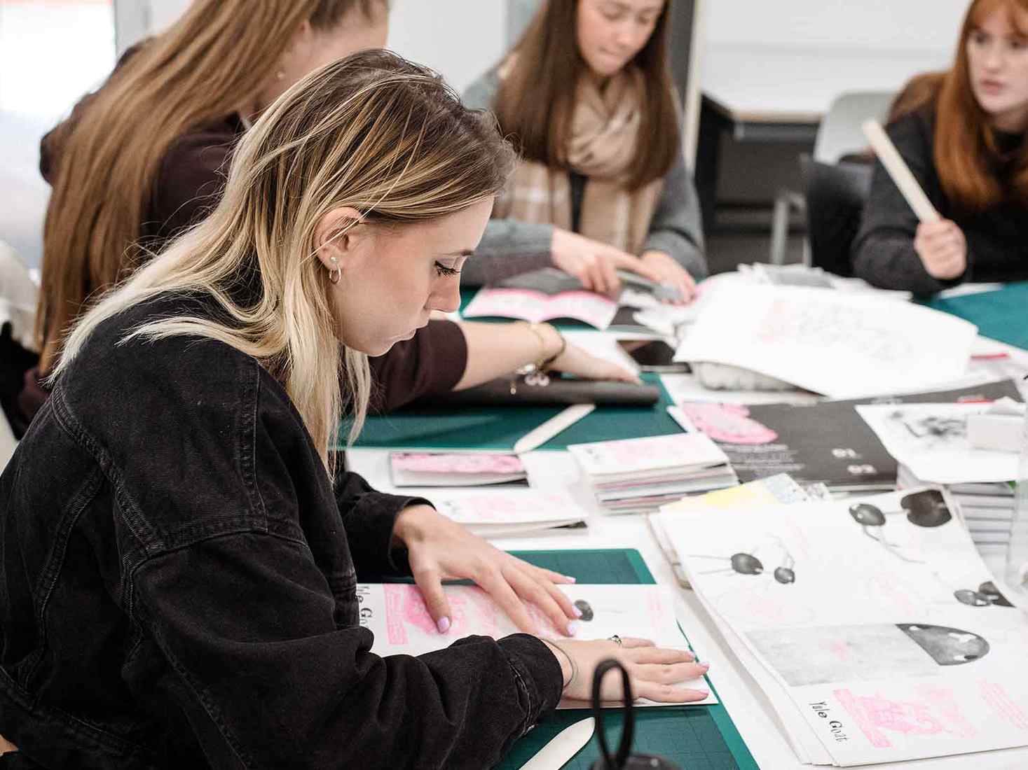 A student working on a graphic design project 