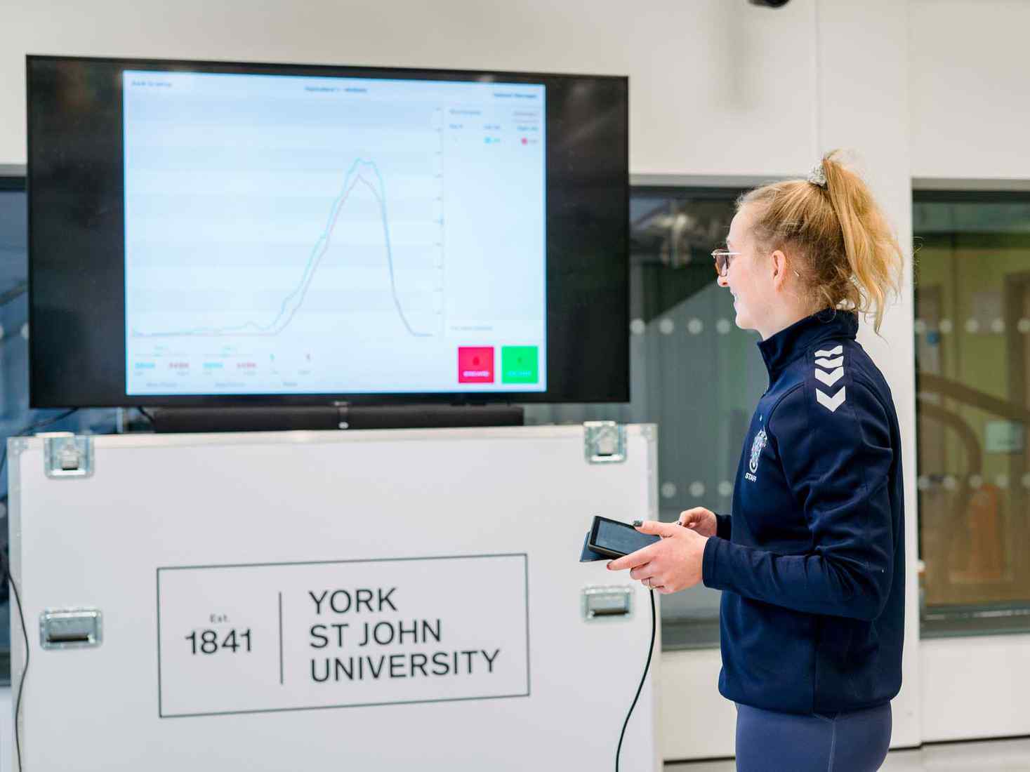 Student using sport science equipment. 