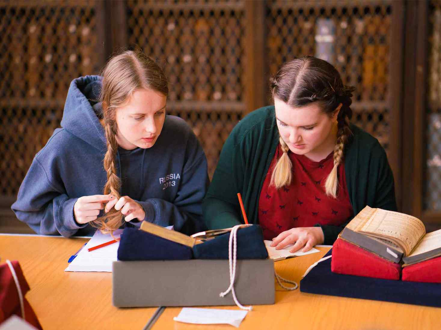 History students working together in an archive. 