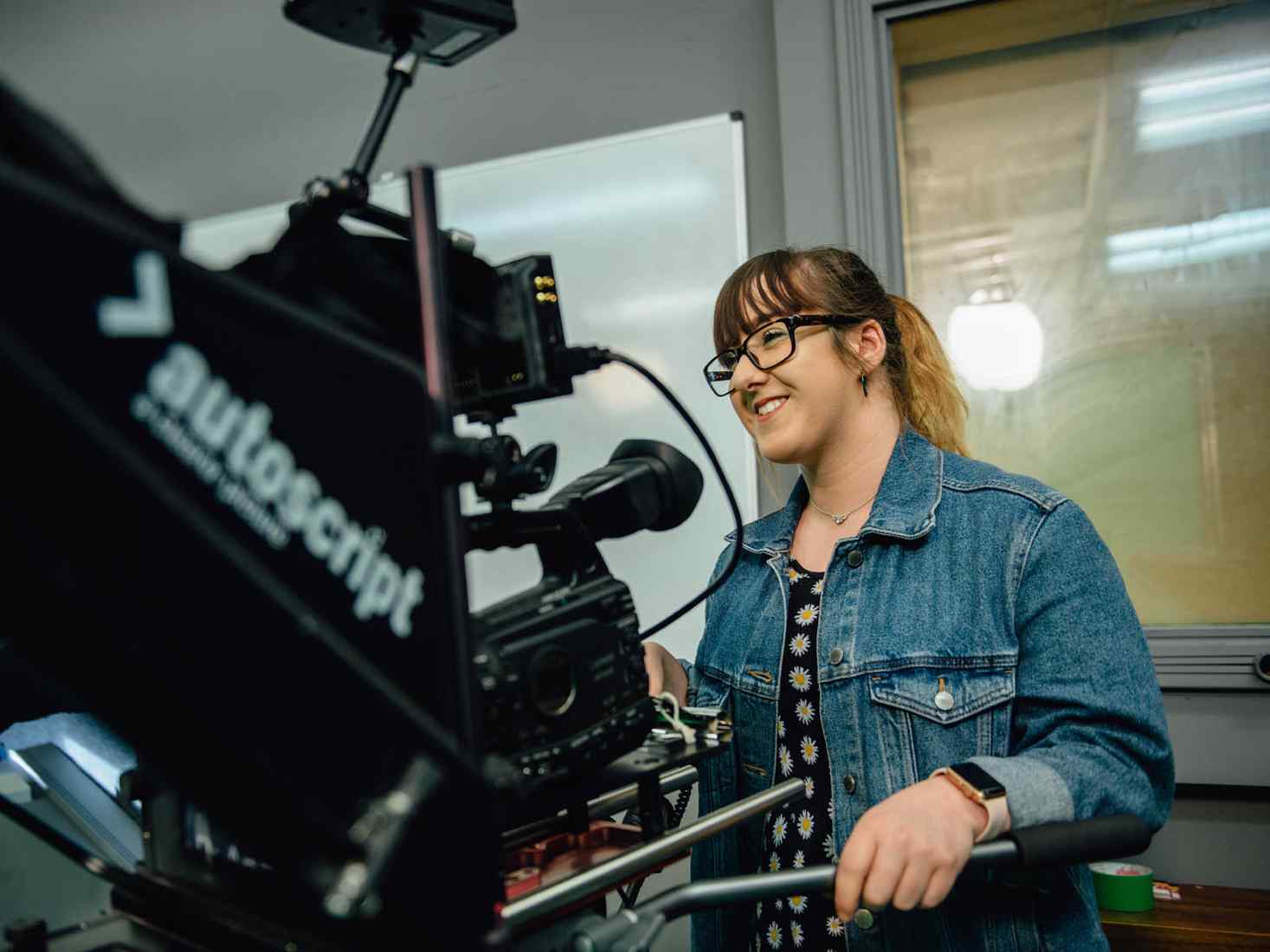 Student using film camera 