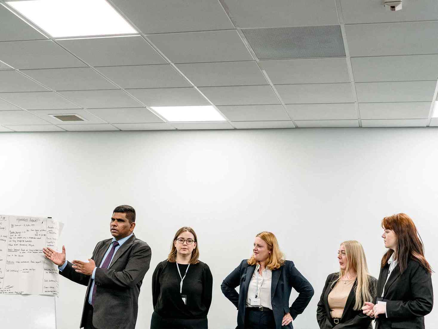 Law students doing a group presentation. 