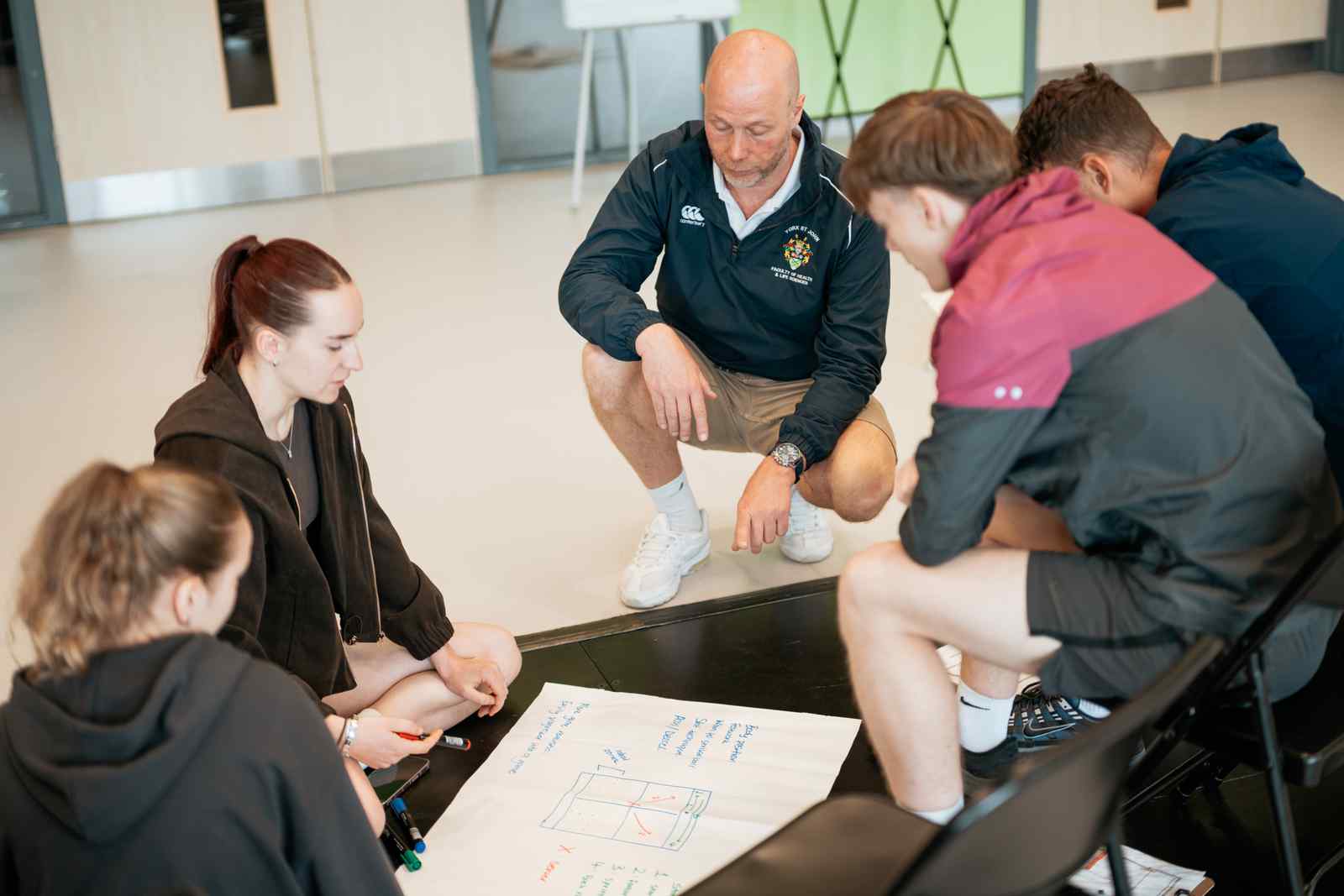 Sport Students working on paper 