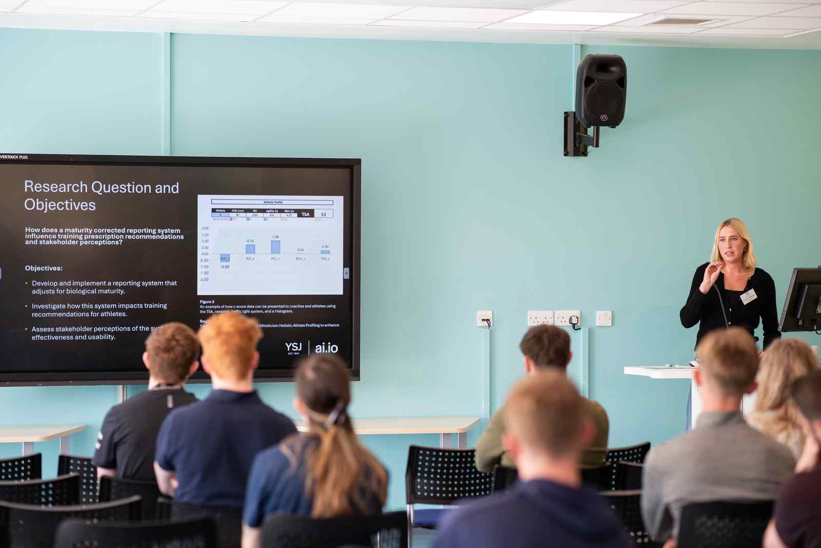 Sport student talk a class through their research 