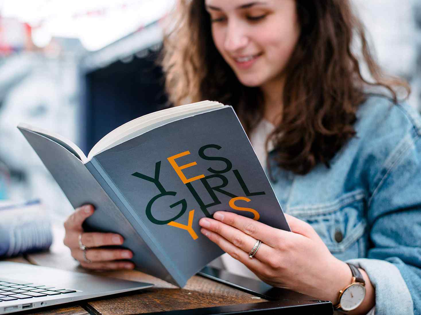student in Spark York reading a book 