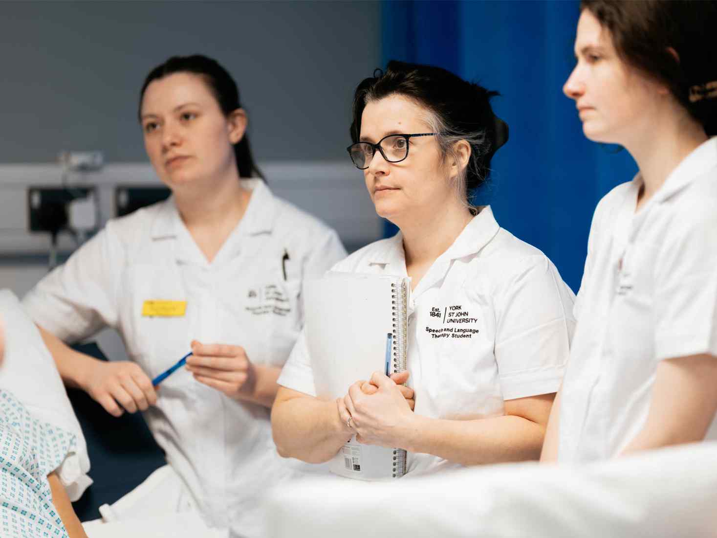 Speech and language therapy students in a ward setting. 