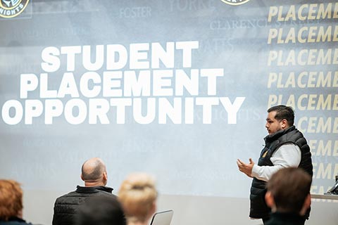 Employer giving presentation about a student placement opportunity 