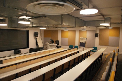 Room 101 in Creative Centre, showing rows of long desks 