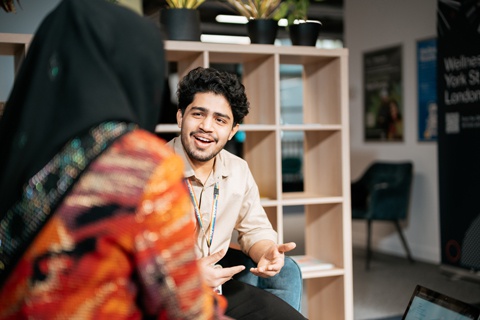 A student receiving support through our student hub. 