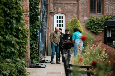 Prospective students interacting with a student ambassador. 
