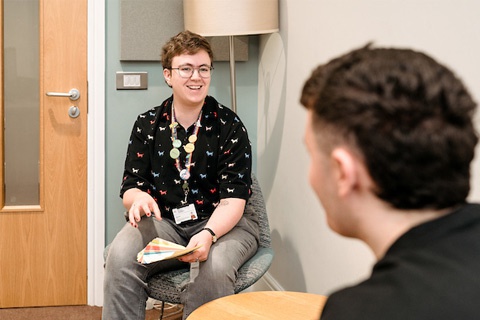 Student and staff member in a support session. 