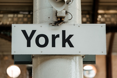 A sign for York in York train station. 
