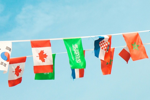 Bunting featuring various countries' flags. 