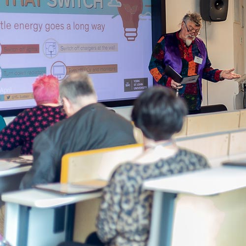 Converge Creative Writing seminar with course tutor speaking to class 