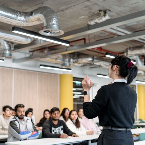 Lecturer giving seminar to students at London Campus 
