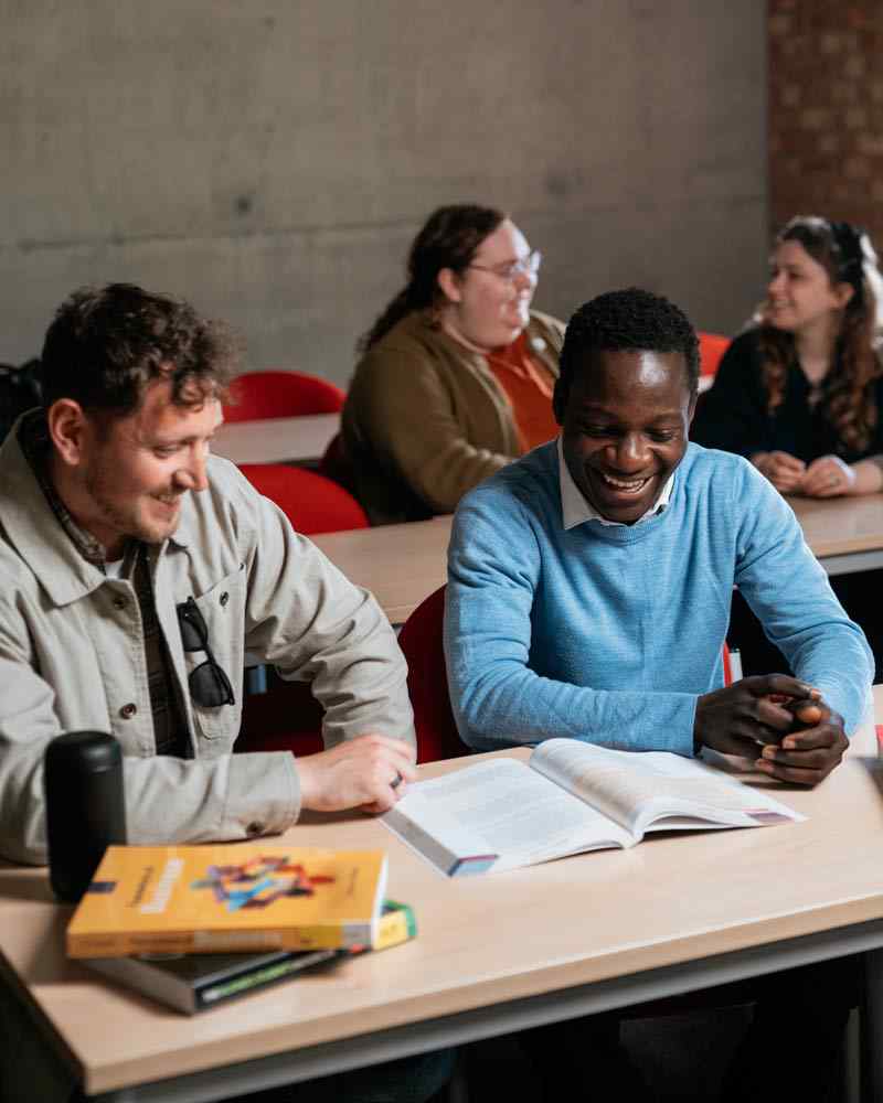Students talking together during a Business class. 
